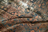 Antique Persian Hamadan rug's Herati and quatrefoil patterns in dusty teal, blush, ivory.