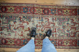 Worn pile and geometric arabesques on antique Caucasian runner with Herati border.