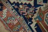 Hand-knotted vintage Karaja runner pile with navy, terracotta, and light blue geometric motifs.