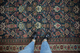 Richly colored Herati field and patterned border of an antique Mahal carpet, with feet.
