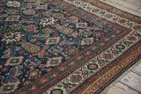 Antique Mahal rug with intricate floral and geometric borders and a rich Herati style field.