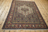 Hand-knotted vintage Persian Senneh rug shown in full, displaying its intricate Herati and Samovar designs.