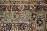 Antique Persian Kermanshah carpet with scrolling Islimi main border, dusty aubergine and ivory blossoms.