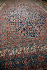 Floor-level perspective of a vintage Bibikabad rug, showcasing its grand scale and extensive pattern.