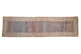 Vintage distressed Malayer runner with allover botehs in abrashed denim blue and pale copper-red.