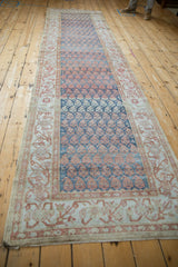 Full length perspective of a distressed Malayer runner, showing the flow of color abrash.
