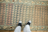 Distressed Malayer runner with decorative abrashes, allover boteh design, layered teal, terracotta.