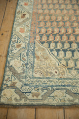 Distressed Malayer rug corner, abrash on layered teal, terracotta botehs, vine border.