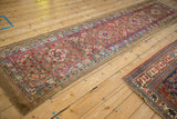Antique Persian Serab runner with a camel hair ground, seen in a full length angled view.
