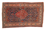Antique Persian Bijar rug, hexagonal cherry red medallion, indigo blue with bird-like Herati motifs, 4'10