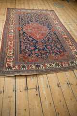 Antique Bijar rug lower end detail: original plain weave, intricate borders, and even pile wear.