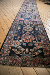 Angled view of a long vintage Lilihan runner highlighting the lustrous sheen of its wool pile.