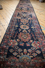 View down the entire length of the vintage Lilihan runner, showing its grand scale and rich colors.