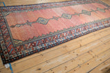 Serrated leaf border and dusty red hexagonal lattice on an antique Hamadan Persian runner.