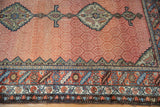 Samovar motifs and a serrated leaf border on an antique Persian Hamadan rug runner.
