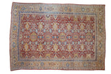 Antique Persian Mahal carpet, repeating floral medallions and arabesques on black cherry red, 10'1