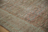 Low-pile texture and heavy color abrash on a distressed antique Fereghan carpet.