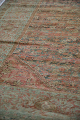 Evenly worn pile of a distressed Fereghan carpet showing knot heads and heavy color abrashes.