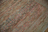 Aged patina and low-pile texture of a distressed Persian Fereghan with distinct color shifts.