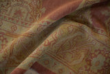 A close-up highlighting the unusually fine weave and low pile of the distressed Oushak rug.
