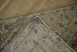 Hand-knotted foundation and distressed pile of an antique Persian Malayer carpet corner.