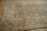 Distressed Fragment Mahal Carpet with coffee brown shrub motif and visible worn foundation.