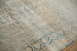 Angled view of the antique Kerman's soft, low pile showing floral details and knot heads.