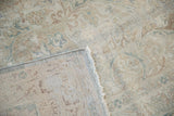 The hand-knotted foundation and secured side cord of the antique Persian Kerman carpet.