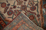 Vintage Hamadan rug close-up, revealing hand-knotted pile and reverse side's tonal variation.