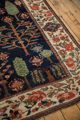 Baktiari runner detail: creamy rose border, navy blue field with cypress tree motifs.