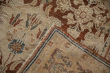 Vintage Bibikabad carpet pile with copper and sky blue blossoms, exposing its fine hand-knotted foundation.