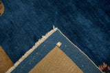Hand-knotted foundation and intact side cord of an antique Peking rug's reverse corner.