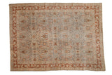 Distressed vintage Tabriz carpet, dusty slate blue field with copper scrolling florals and trellis vinery. 9' x 12'5