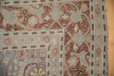 Distressed Vintage Tabriz carpet corner with faded floral arabesques and trellis vinery.