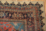 Corner spandrel with dragon style arabesques and floral borders on a Halvaie Bijar antique carpet.