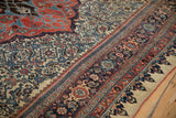 Detailed view of dragon arabesques, Herati field, and borders on an antique Halvaie Bijar carpet.