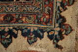 Timeworn corner of an antique Halvaie Bijar carpet showing exposed foundation and knot heads.