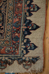 Low pile texture showing the knot heads and side cord selvage on an antique Halvaie Bijar carpet.