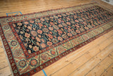 Early 20th century Northwest Persian runner with blush floral field and multi-colored borders.