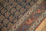 Antique Kurdish runner's navy field, staggered pink grapefruit boteh, aubergine floral main border.