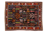 Vintage 1940s Bakhtiari garden design carpet with unidirectional trees, navy field, madder red border.