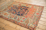 Intricate sampler layout of an antique Persian Malayer rug with distinct Herati and geometric panels.
