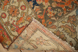 Hand-knotted foundation and secured side cord selvage of an antique Malayer sampler rug.