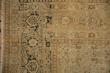 Close view of the turtle samovar border showing mostly even wear down to the knot heads.