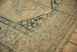 Close-up on the restored selvage and worn, low pile of an antique Kurdish runner.