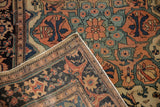 Folded corner of an antique Farahan Sarouk rug revealing its hand-knotted foundation and side cord.
