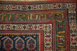 Antique Northwest Persian rug corner with navy field, unusual deep green main border, and intricate patterns.