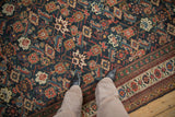 Vivid Herati style design with geometric contouring on a hand-knotted antique Mahal carpet.