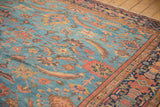 Antique Mahal carpet with indigo multi-tiered border and abrashed sky blue field.