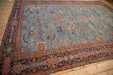 Antique Mahal carpet's multi-tiered rainbow floral border in indigo, brick red, and blush.